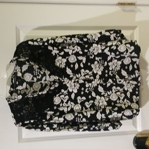 Black blouse with white and gray flowers
